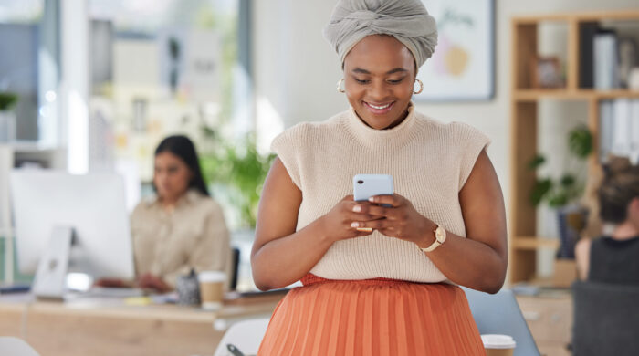 Black Business Woman Texting On A Phone Smiling W 2022 12 08 23 55 15 Utc