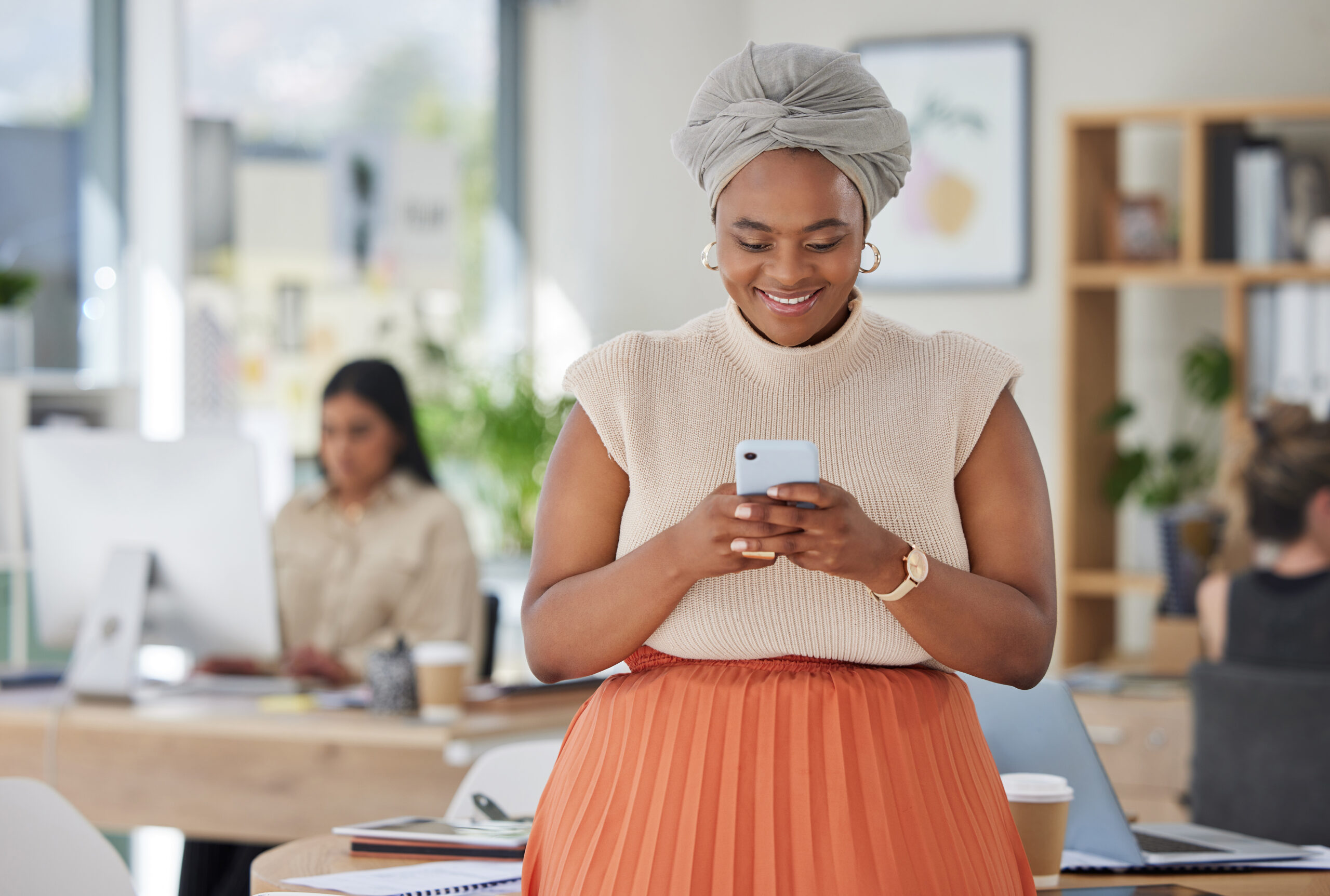 Black Business Woman Texting On A Phone Smiling W 2022 12 08 23 55 15 Utc