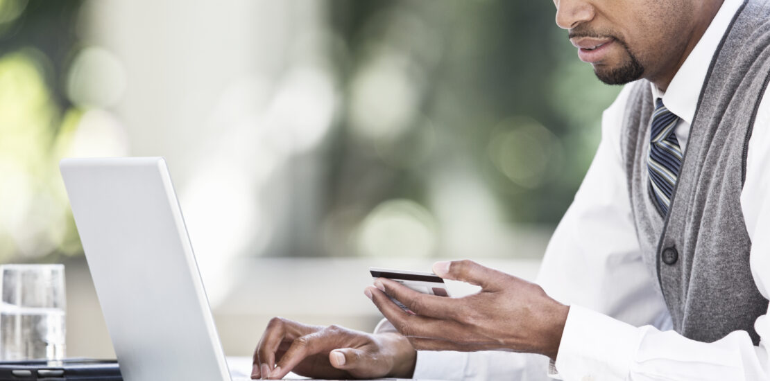 Black Man Business Person In A Business Center.