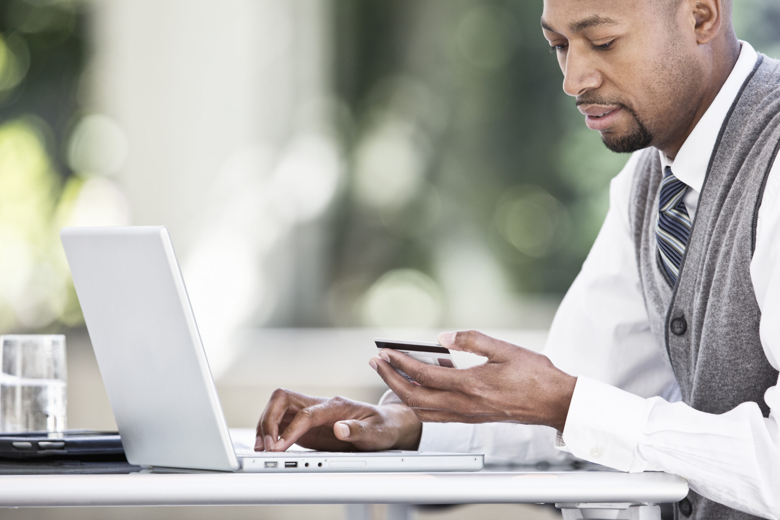 Black Man Business Person In A Business Center.