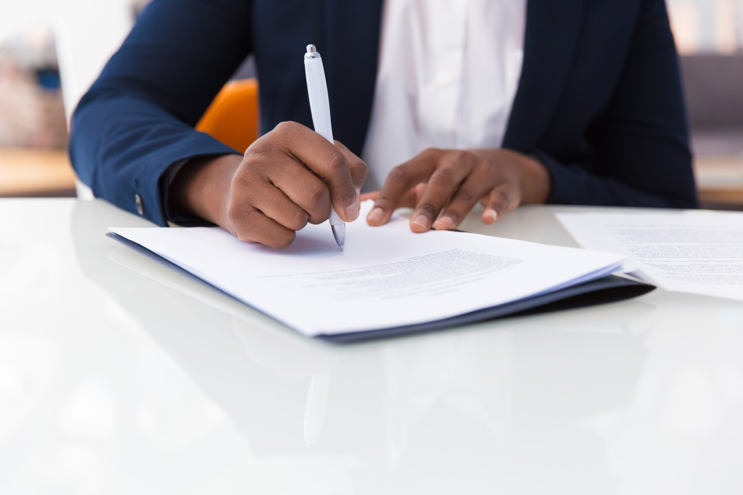 Businesswoman signing contract Businesswoman Signing Contract