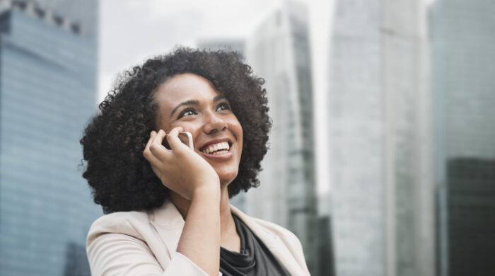 Businesswoman Talking On The Phone In The City Remixed Media