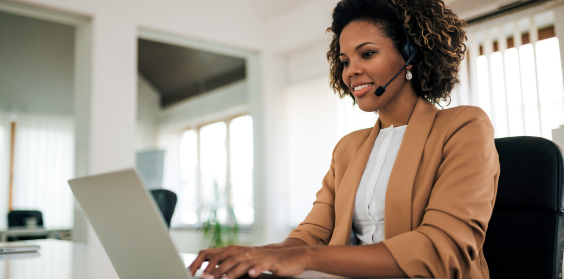 Close Up Portrait Of A Customer Service Agent At Work.
