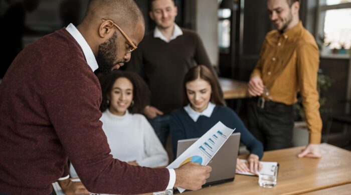 colleagues-having-meeting-office